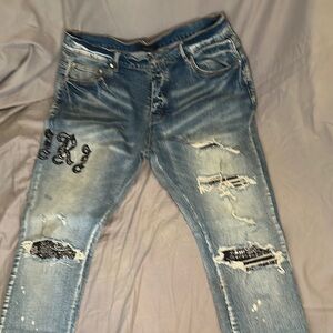 Distressed Blue Jeans with Black Embroidery